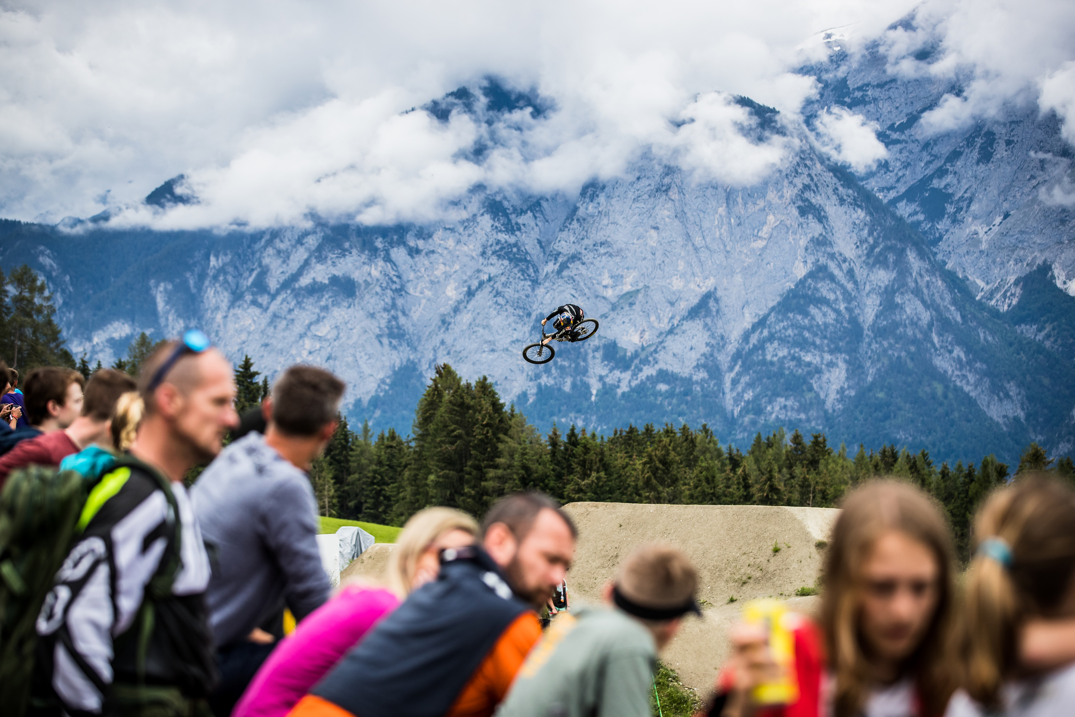 Emil Johansson spins in front of a massive backdrop. Crankworx Innsbruck 2019.